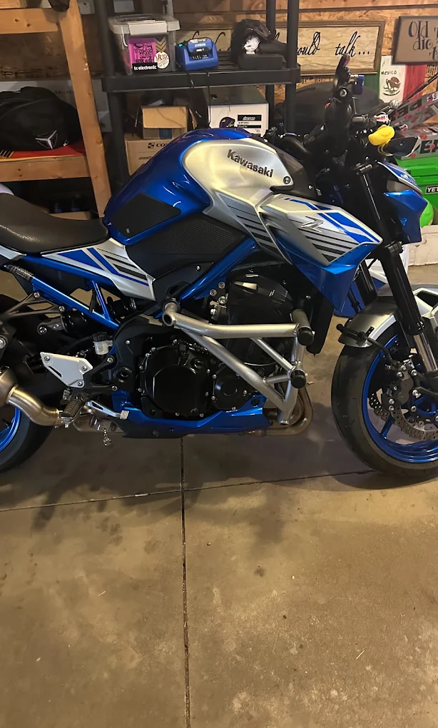 Motorcycle with a custom candy-blue powder-coated frame